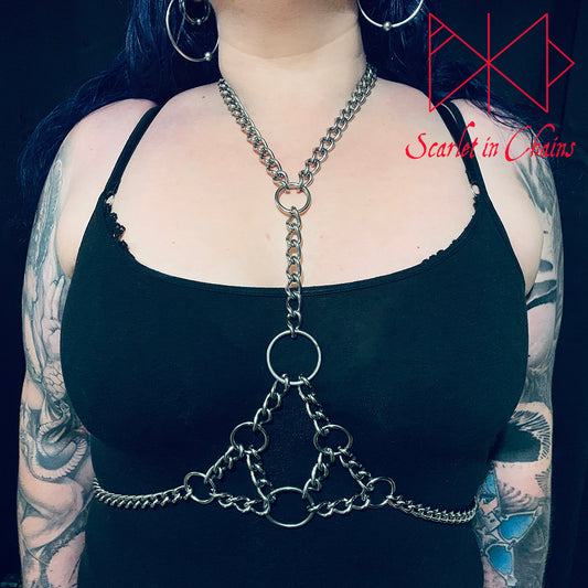 As above so below body harness goth harness alternative harness stainless steel harness chain harness shown worn on female