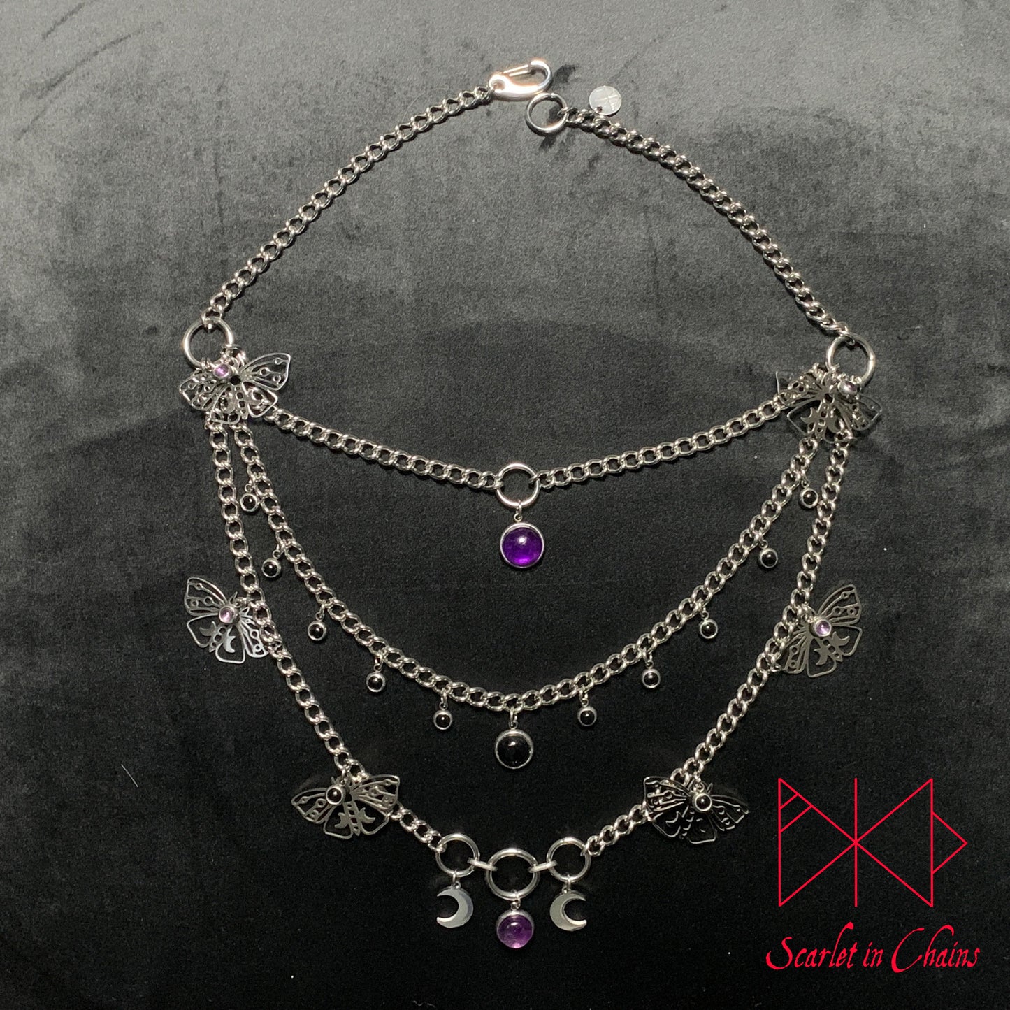 Stainless Steel Moths to a Violate Flame Necklace - Statement Necklace - Amethyst Black Onyx - O ring collar showing on flat