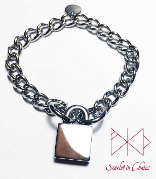 flat shot of stainless steel padlock cuff