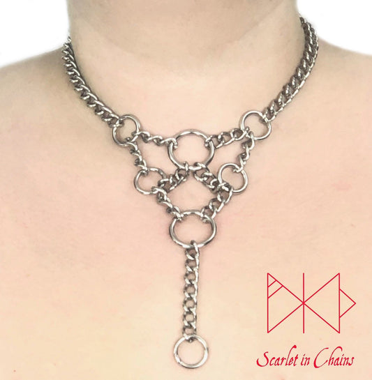 worn shot of summoner collar stainless steel chain collar with geometric style design with chain and O rings