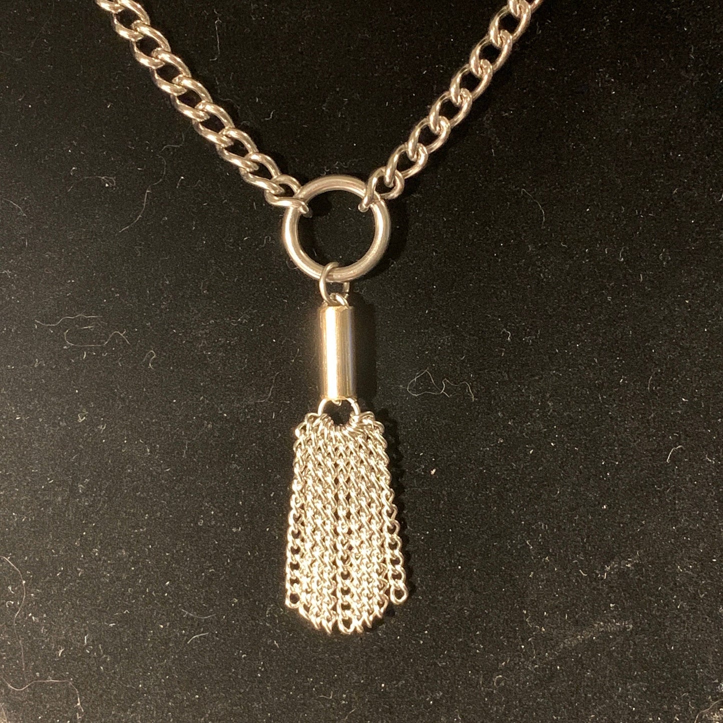 304 Stainless steel Nine Tails Flogger Necklace Close up view