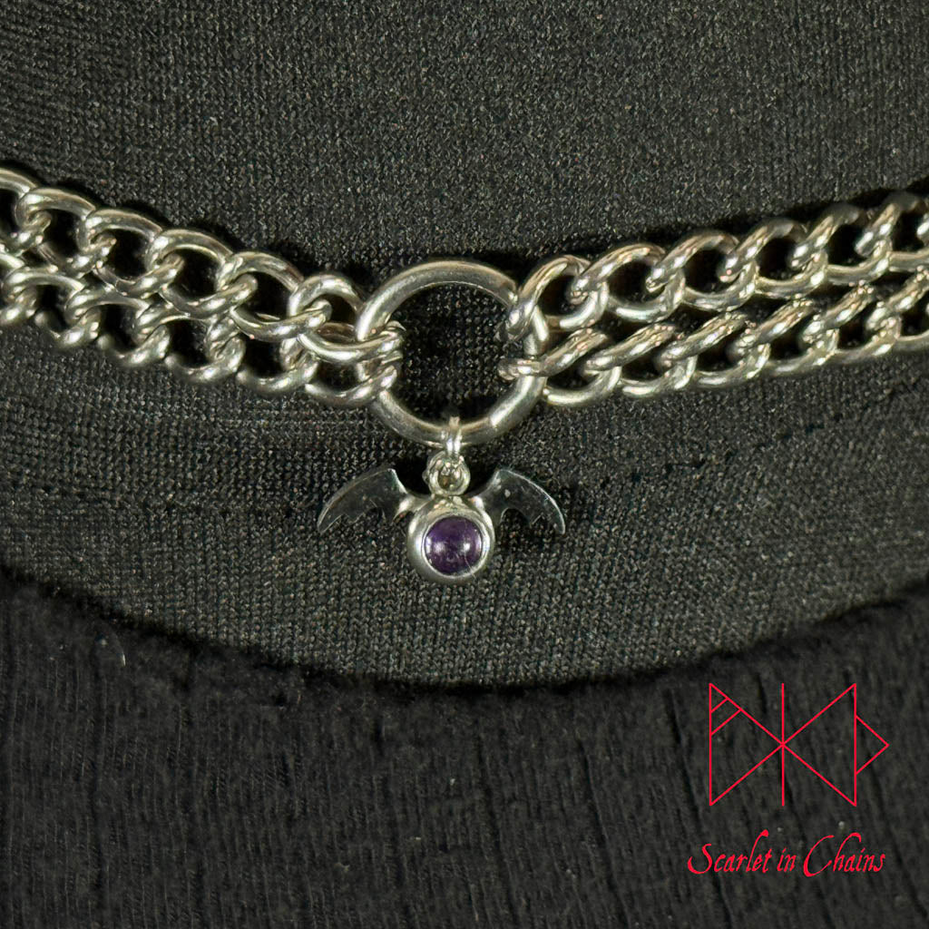 Stainless Steel Crystal Vampire Bat Choker - Amethyst choker - O ring collar - subtle collar Shown Close up, goth choker, alternative collar, stainless steel jewellery, goth jewellery, event jewellery. Goth Necklace, Stainless Steel Necklace, Event Necklace, witch jewellery, witch necklace, witchy necklace, witchy jewellery, occult jewellery