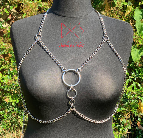 Alignment body harness, a halter-neck stainless steel chain harness. with triangular chains over the chest bikini top style. with 3 depending in size, Stainless Steel O rings. fasted with a stainless steel clasp at the waistband front view