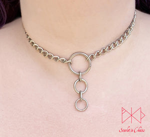 Alignment mini choker worn Stainless steel chain collar with central O ring with 2 smaller o rings suspended from it shown with new links