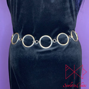 worn shot of Solar belt, large stainless steel O rings joined with large stainless steel chain links
