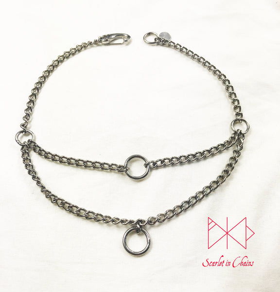 flat shot of micro stainless steel chain multi layer luna rockstar choker finished with a stainless steel clip