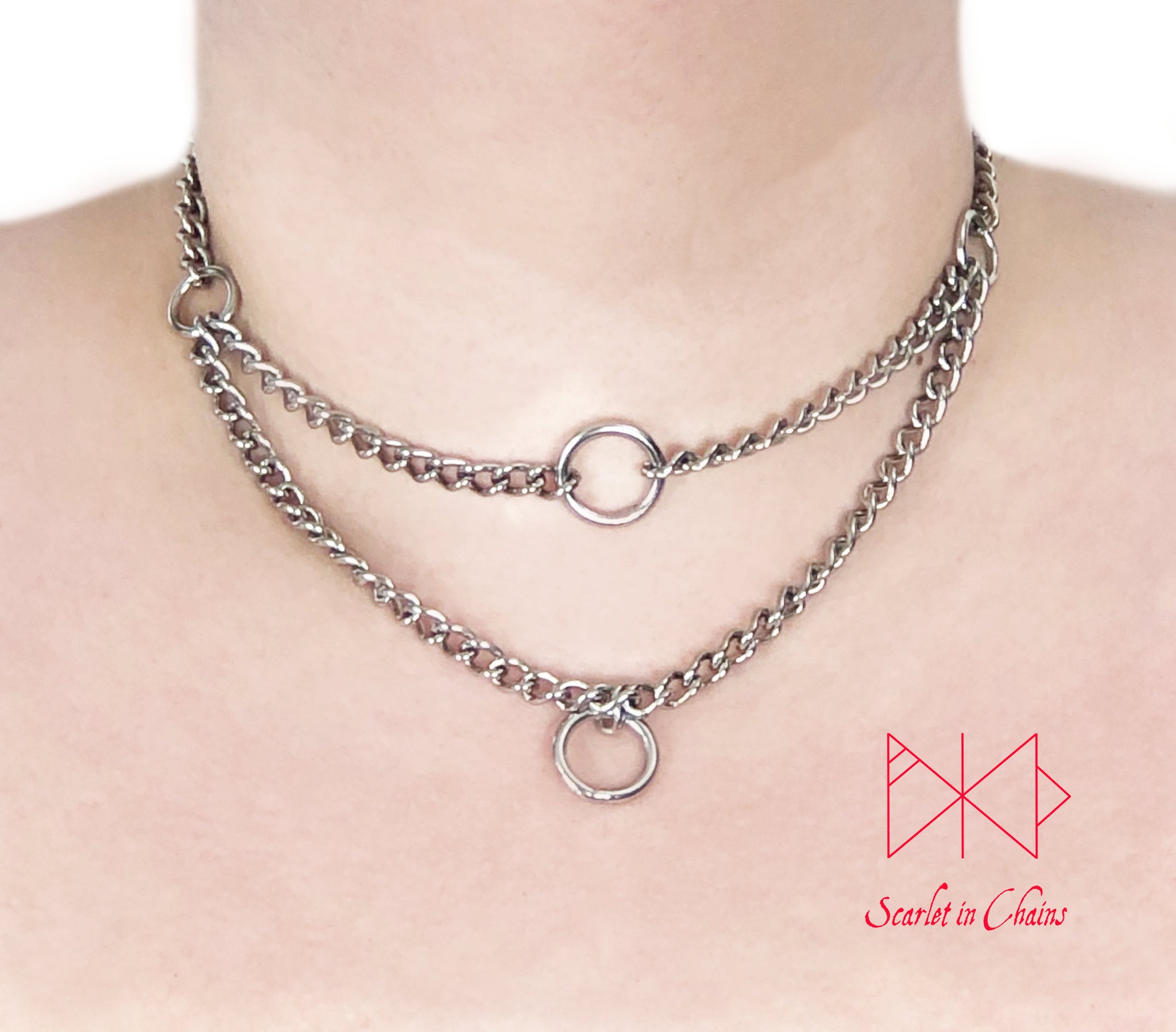 Stainless steel micro chain multi layer choker, tope layer is an O ring choker with a O ring pendant for the second layer.