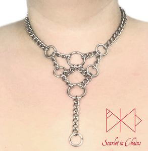 worn shot of summoner collar stainless steel chain collar with geometric style design with chain and O rings 